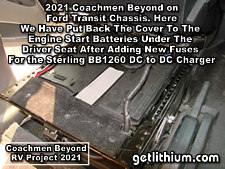 2021 Coachmen Beyond on a Ford Transit Chassis RV Lithionics Battery lithium-ion battery installation project photo - engine start battery area work - battery cover put back in place